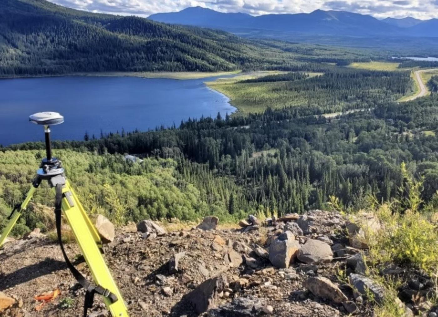 GNSS receiver on a ridge above a northern lake